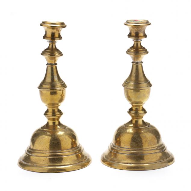 marcin-jarra-poland-1852-1938-a-pair-of-brass-candlesticks