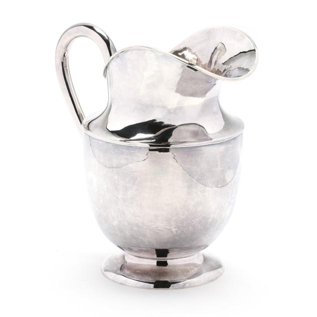 a-sterling-silver-water-pitcher-by-eugene-ferner