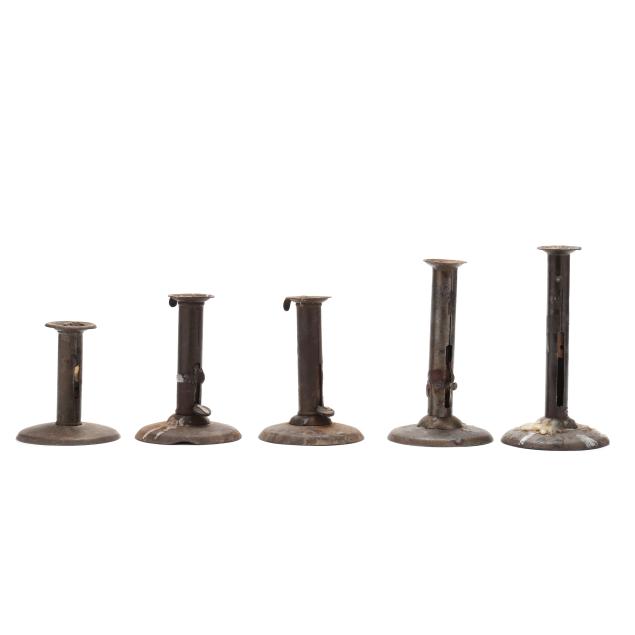 assortment-of-five-hogscraper-candlesticks