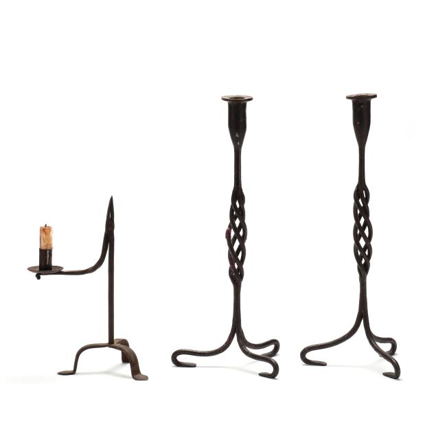 three-wrought-iron-candlesticks