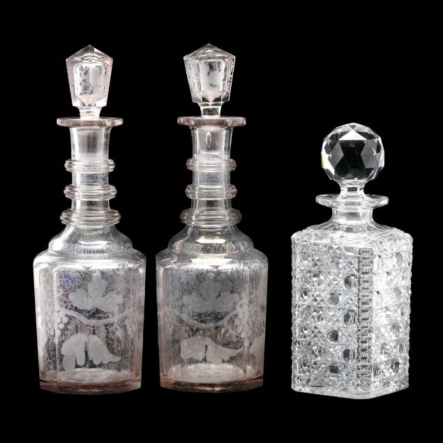 three-antique-cut-glass-decanters