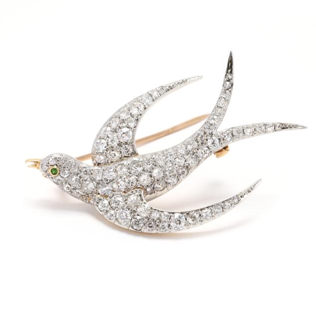 antique-platinum-topped-gold-and-diamond-flying-swallow-motif-brooch