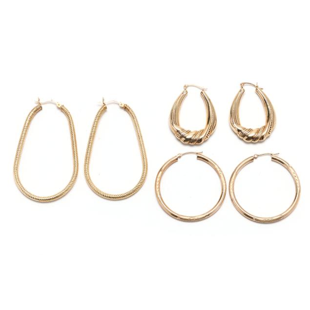 three-pairs-of-gold-hoop-earrings