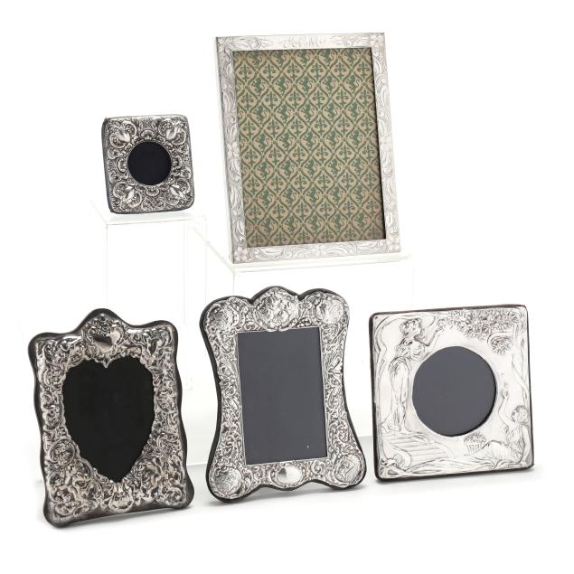 a-collection-of-five-sterling-silver-picture-frames