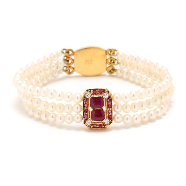 high-karat-gold-and-gem-set-triple-strand-pearl-bracelet