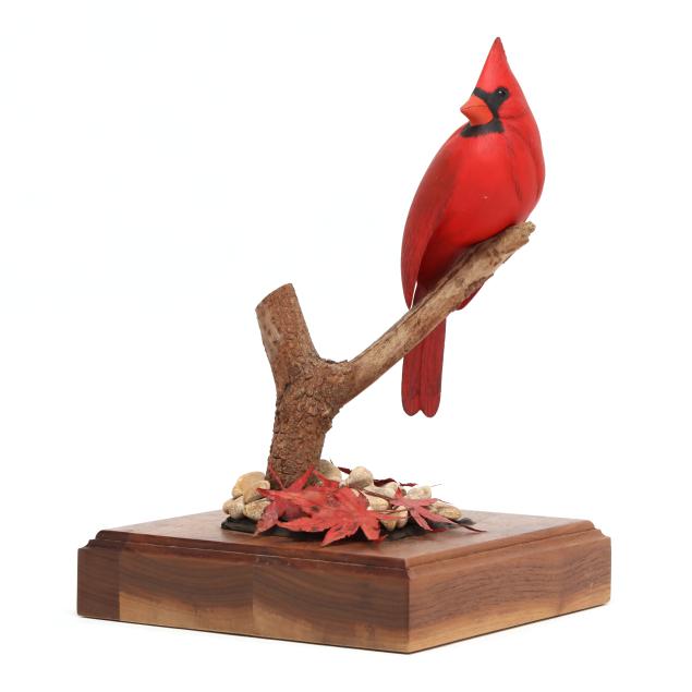 john-hodge-nc-cardinal-on-decorated-wood-base