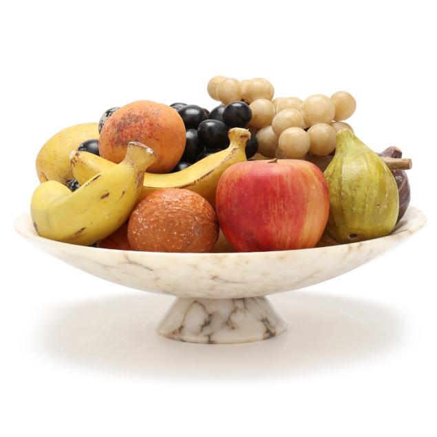 an-assortment-of-vintage-stone-fruit-in-a-marble-centerpiece-bowl