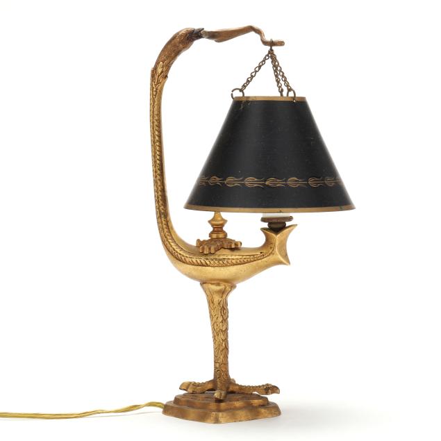 a-brass-and-tole-zoomorphic-aladdin-form-table-lamp