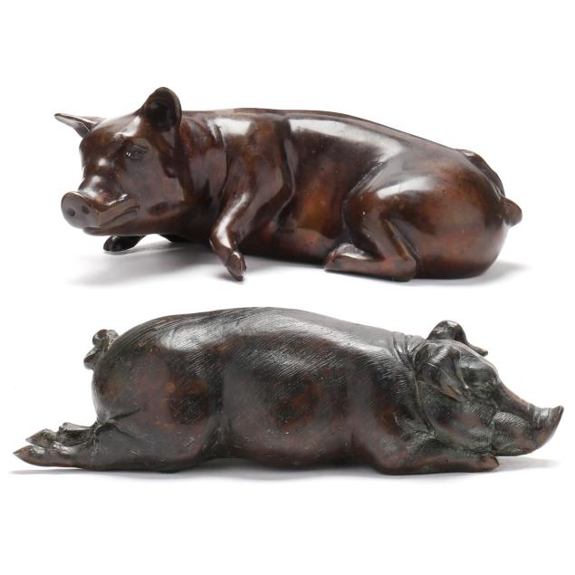 maitland-smith-two-reclined-bronze-pigs