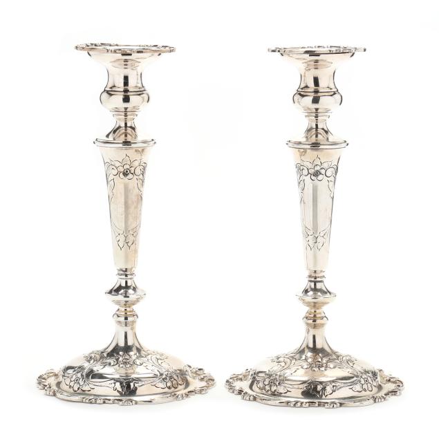 a-pair-of-sterling-silver-candlesticks