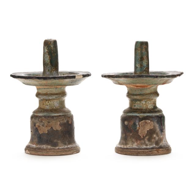 a-pair-of-pottery-candle-holders-or-incense-burners