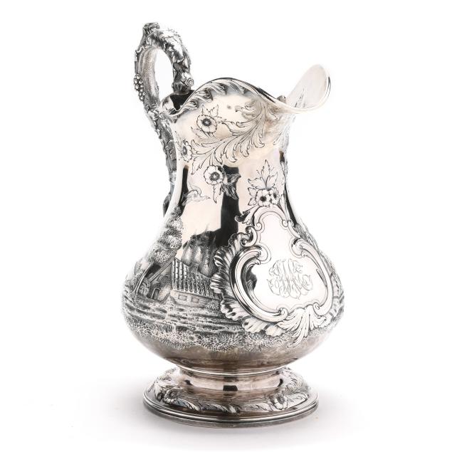 a-large-coin-silver-landscape-pitcher-by-bailey-co