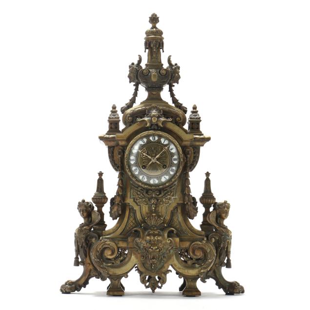 a-neoclassical-style-patinated-bronze-mantel-clock