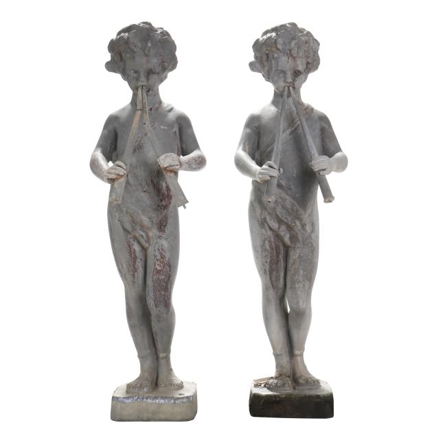 a-pair-of-vintage-cast-lead-fountain-statues-of-piping-boy-pan