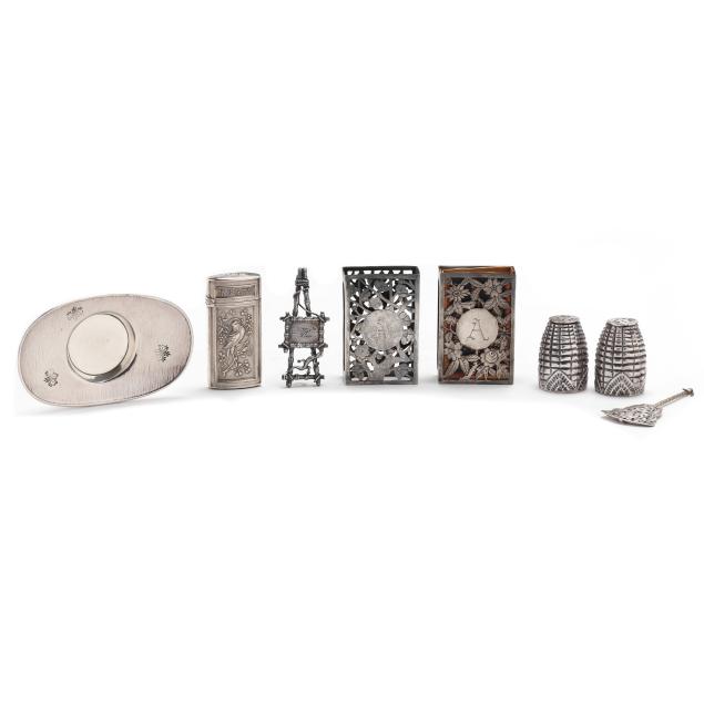 group-of-eight-asian-silver-accessories