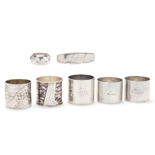 assortment-of-seven-american-sterling-silver-napkin-rings