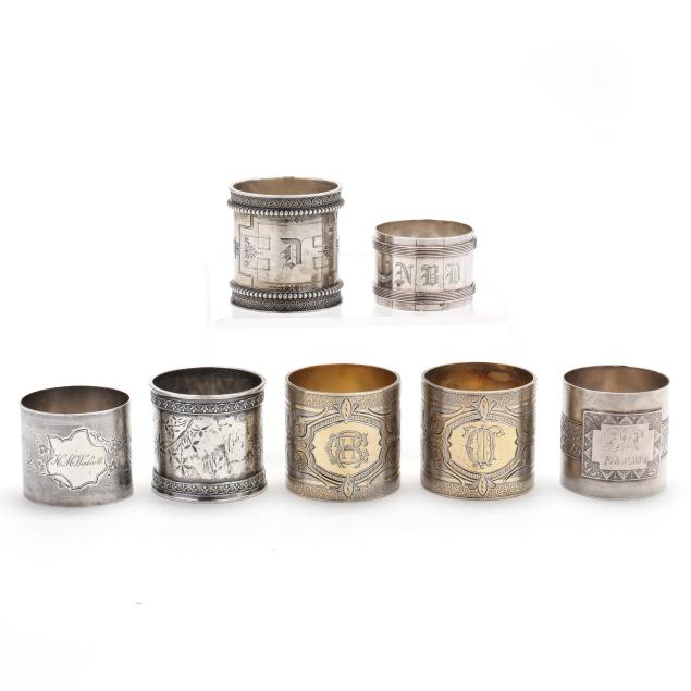 assortment-of-seven-american-silver-napkin-rings