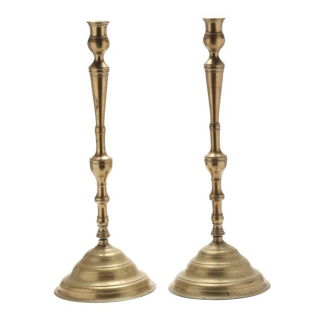 a-pair-of-continental-tall-turned-brass-candlesticks