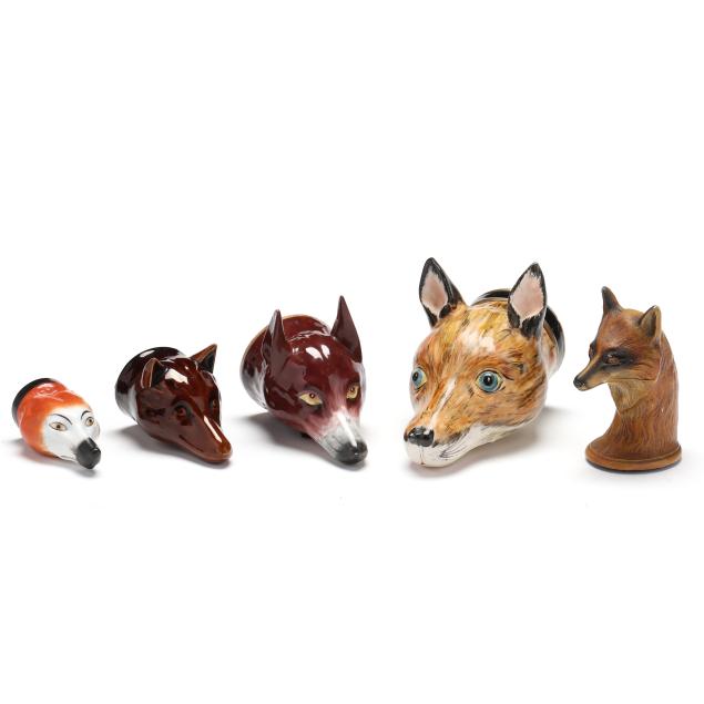 a-collection-of-fox-head-form-stirrup-cups