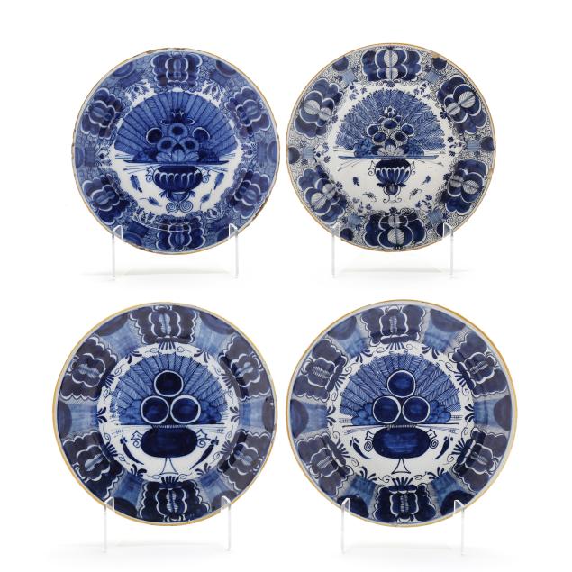 four-very-similar-signed-dutch-delft-peacock-feathers-plates