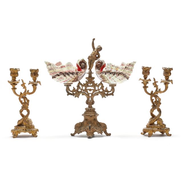 a-continental-ormolu-majolica-shell-centerpiece-and-pair-of-candlesticks