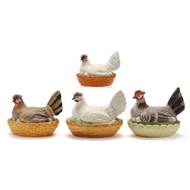 a-group-of-four-bisque-porcelain-hens-on-nests