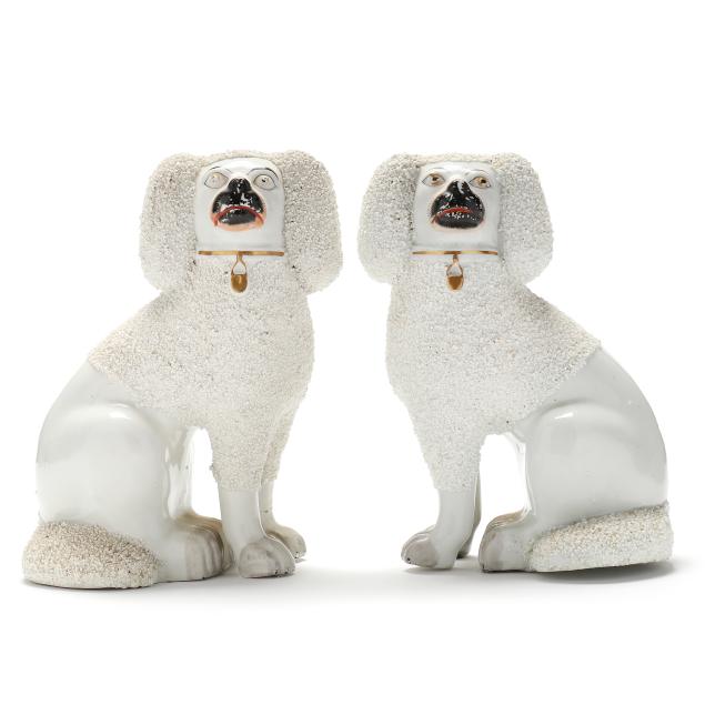 a-facing-pair-of-english-staffordshire-poodles