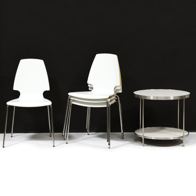 four-modernist-white-laminate-chairs-and-side-table