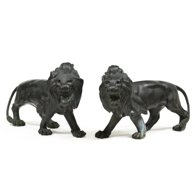 an-impressive-pair-of-large-patinated-bronze-lion-statues