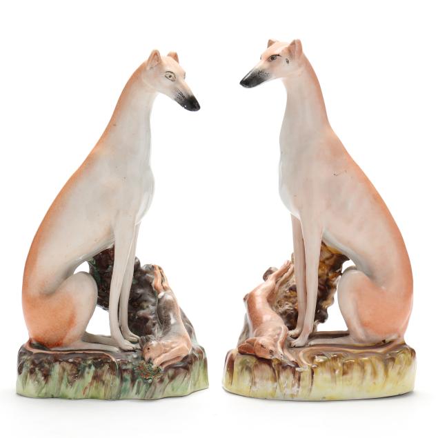 a-large-facing-pair-of-staffordshire-whippets-with-hare