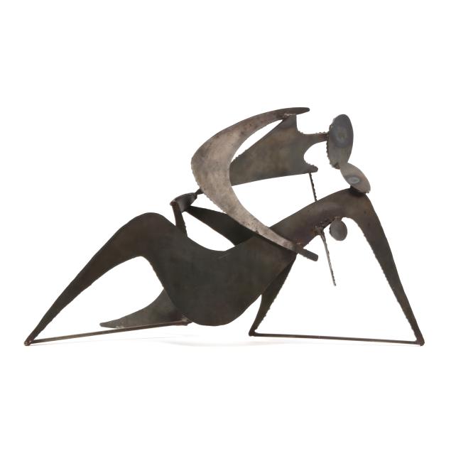 a-brutalist-steel-sculpture-of-two-lovers