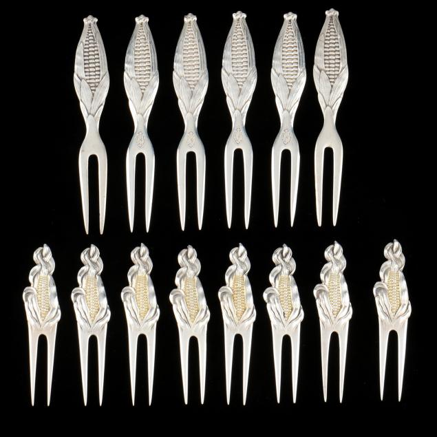 two-sets-of-sterling-silver-corn-cob-holders