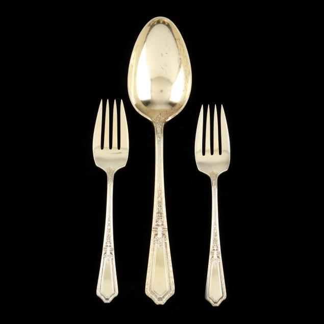 three-pieces-of-international-i-d-orleans-i-sterling-silver-gold-wash-flatware