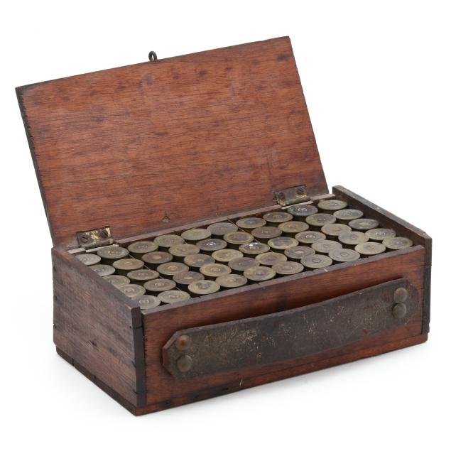 early-shotgun-shell-box-with-winchester-brass-shell-hulls