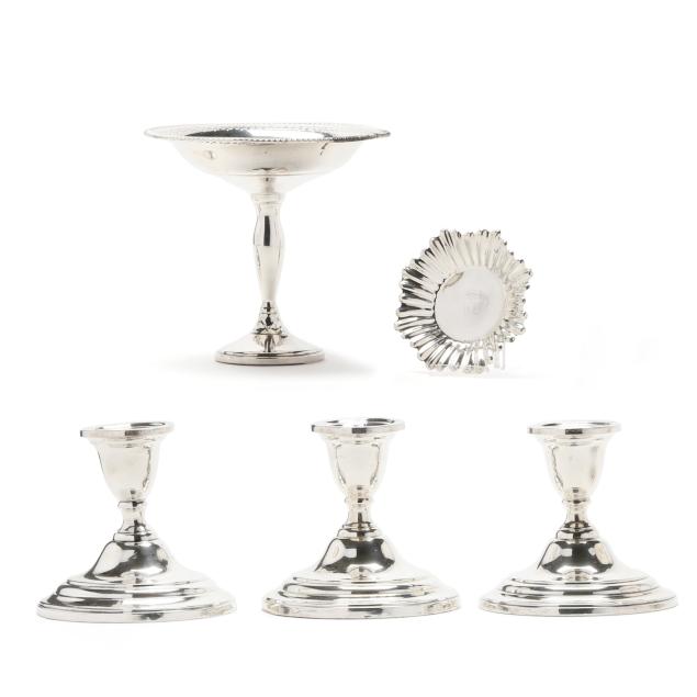 four-sterling-silver-weighted-table-accessories-and-a-silver-ashtray