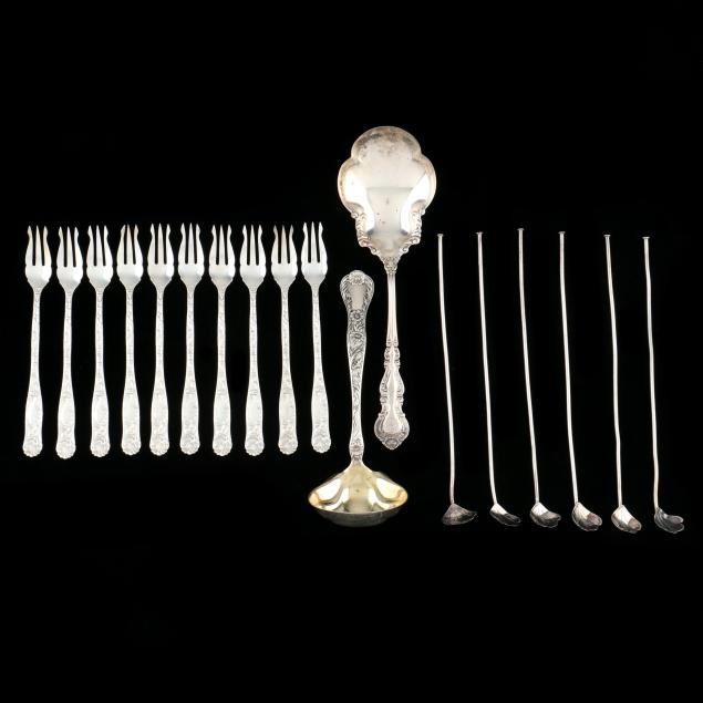 assortment-of-silver-flatware-and-servers