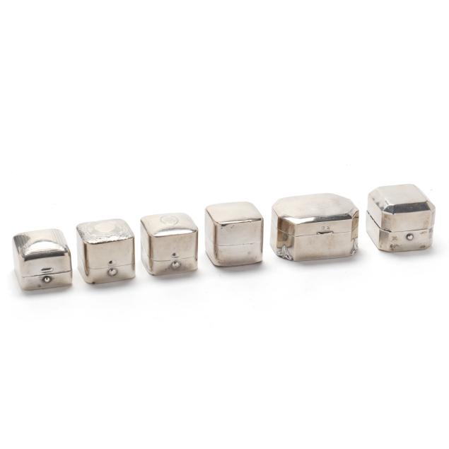 a-collection-of-six-sterling-silver-ring-boxes