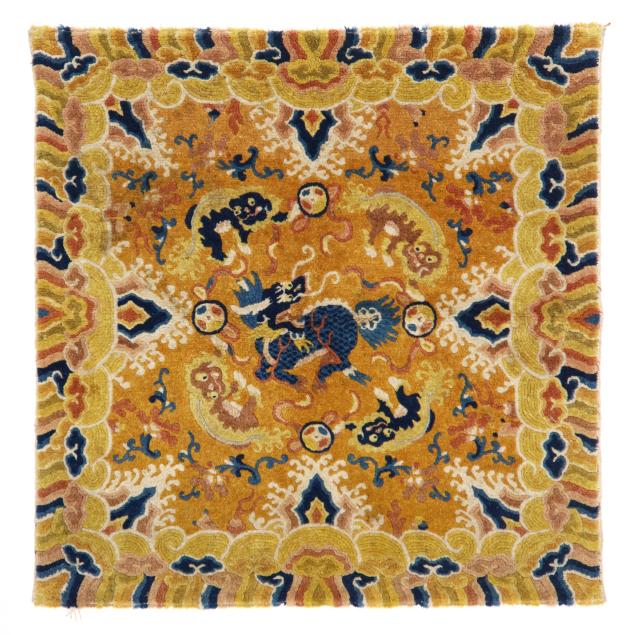 a-tibetan-yellow-ground-rug-with-i-qilin-i