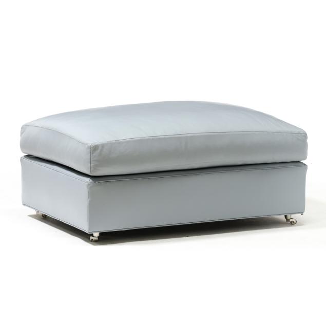 pale-blue-leather-upholstered-ottoman