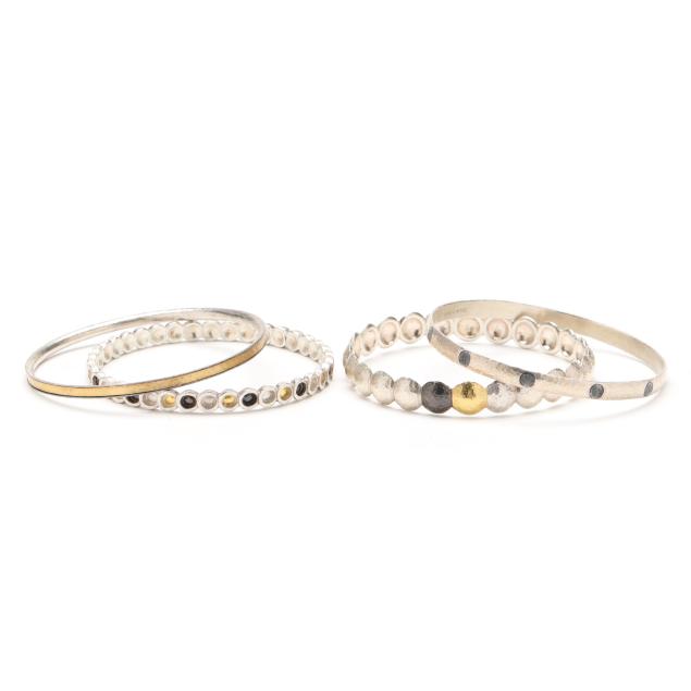 group-of-three-sterling-silver-and-gold-bangles-and-a-sterling-silver-bangle-gurhan