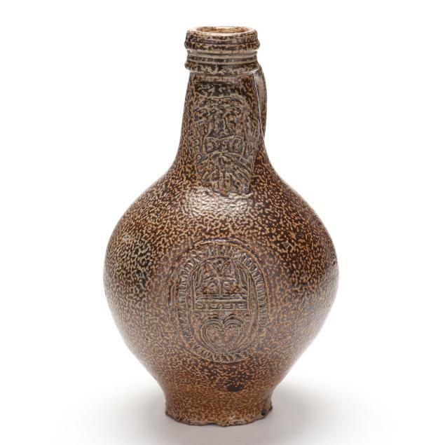 a-stoneware-bellarmine-jug