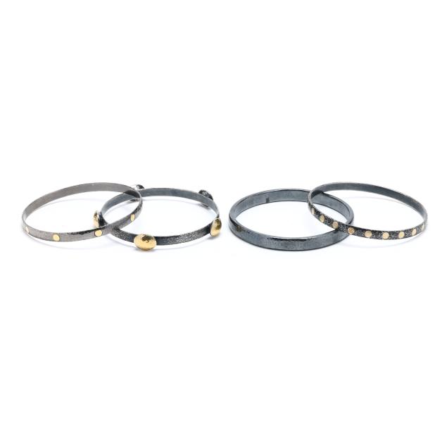 group-of-three-oxidized-sterling-silver-and-gold-bangles-and-a-sterling-silver-bangle-gurhan