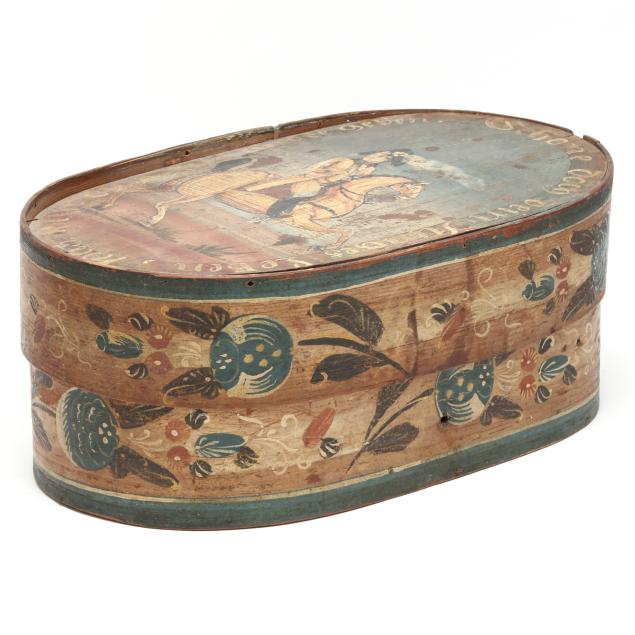 an-antique-brides-box-with-a-rider-on-horseback