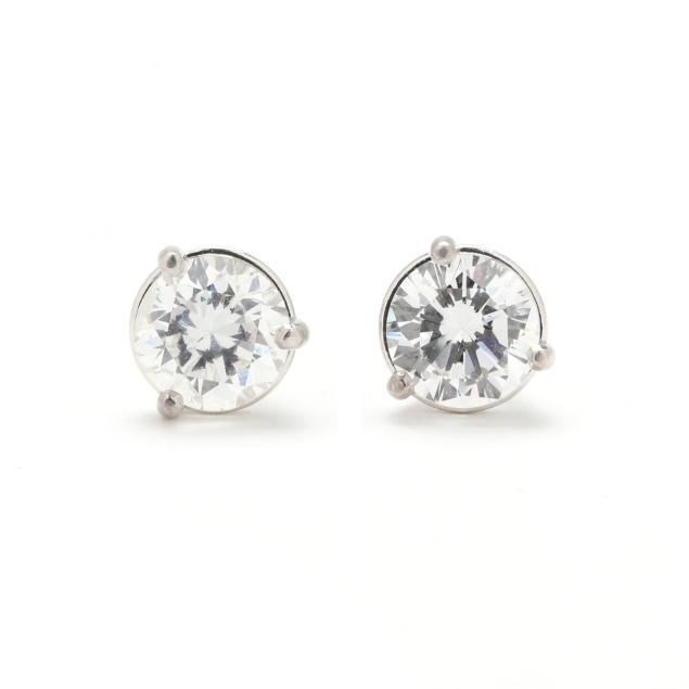 a-pair-of-white-gold-diamond-stud-earrings