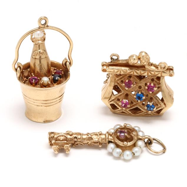 three-vintage-gold-and-gem-set-charms