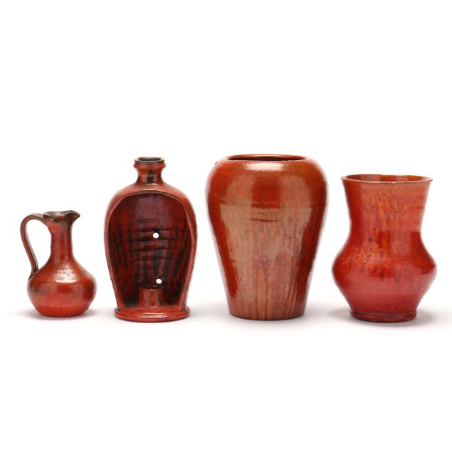 four-signed-nc-chrome-red-glazed-vessels