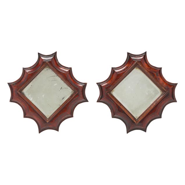 an-antique-pair-of-small-shaped-mahogany-mirrors