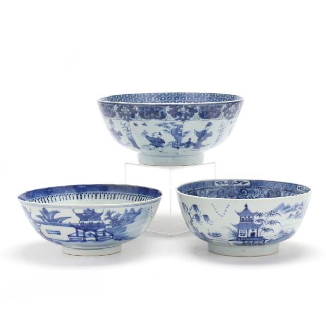 a-group-of-three-chinese-export-porcelain-blue-and-white-bowls