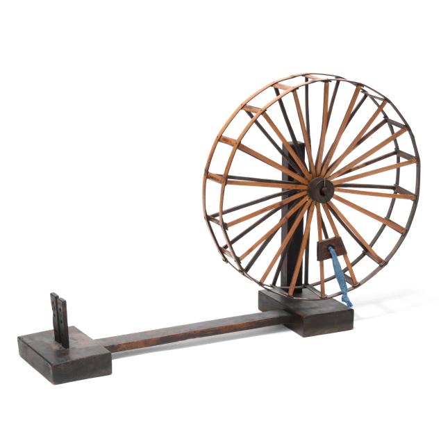 an-antique-asian-spinning-wheel